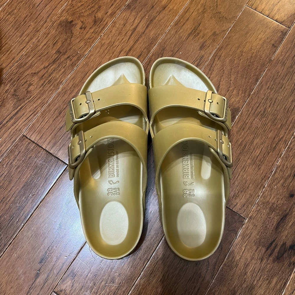 Birkenstock Gold Sandals with Adjustable Straps and Comfortable Footbed